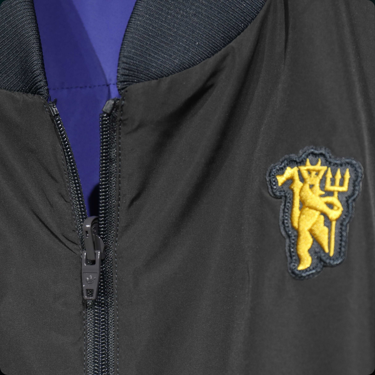 Chamarra Terrace Icons Reversible Manchester United (2025/26) – Authentic