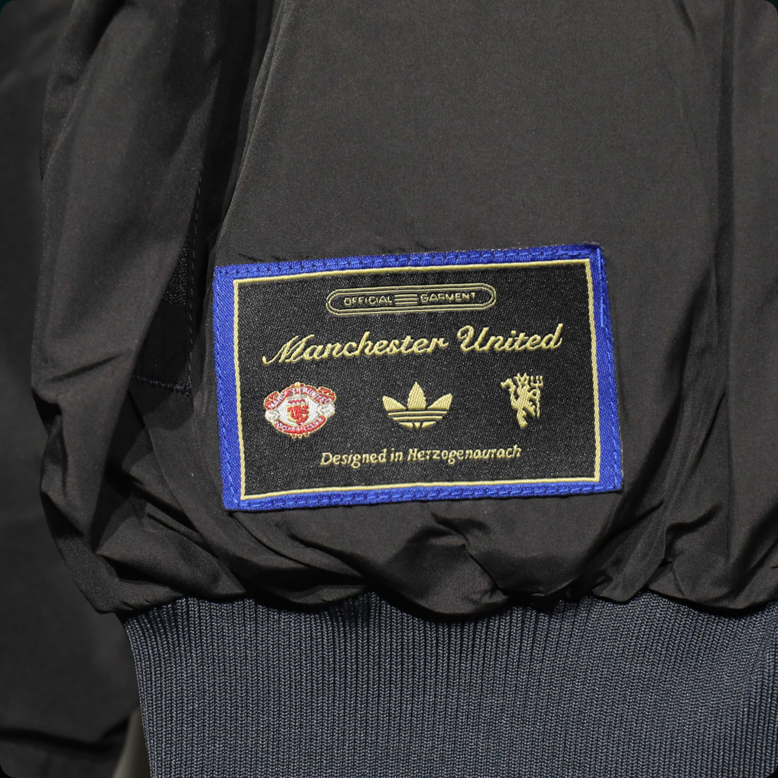 Chamarra Terrace Icons Reversible Manchester United (2025/26) – Authentic